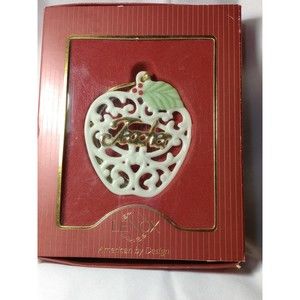 Lenox Teacher ornament shaped like an apple with teacher written in gold letters